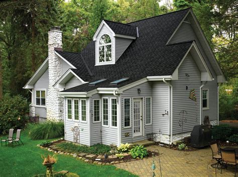 grey house white metal roof|gray homes with black roofs.